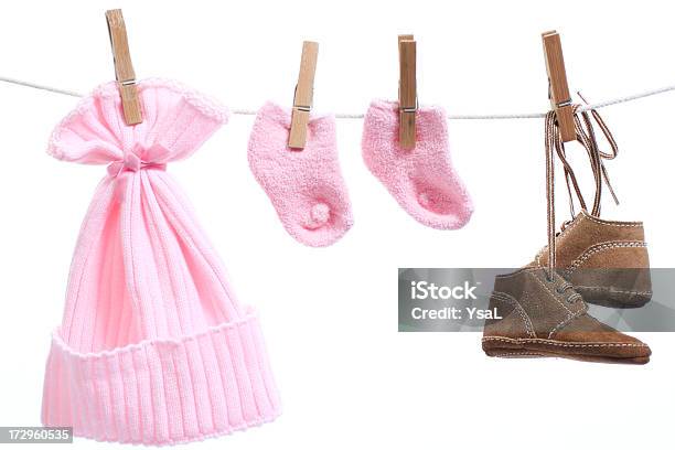 Baby Goods Hanging On The Clothesline Stock Photo - Download Image Now - Baby - Human Age, Baby Booties, Clothesline