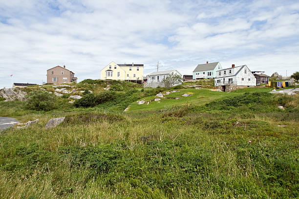 a scene at an old fishing villiage in canada's old historic peggy's cove