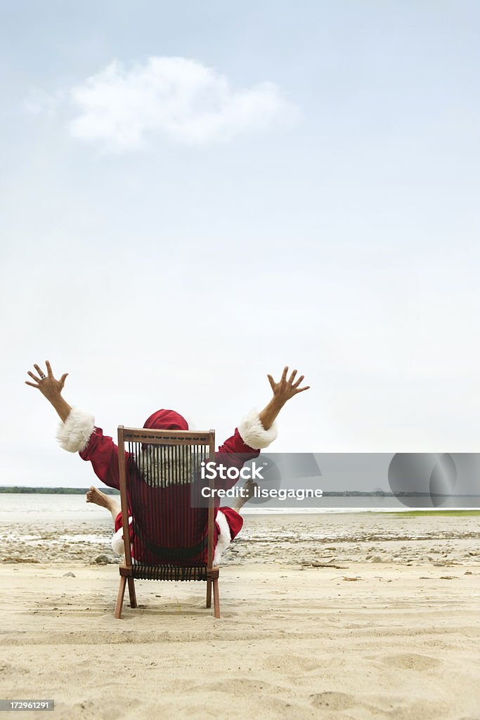 Santa Claus in Vacations Santa Claus at the beach http://www.lisegagne.com/lightboxes/santa.jpg Beach Stock Photo