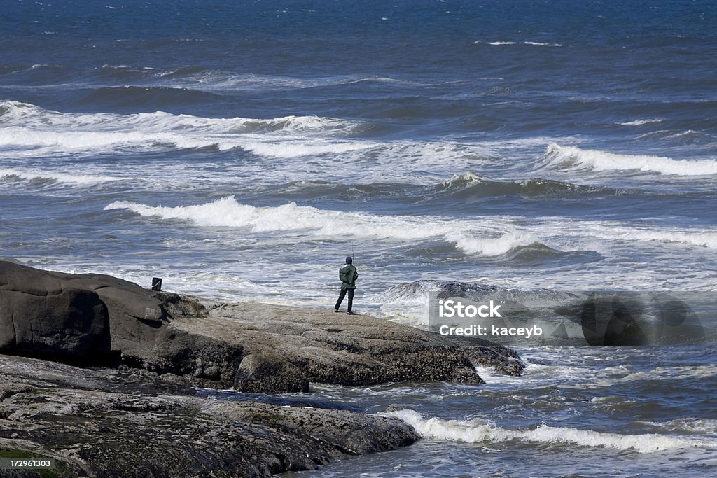 Pêcheur - Photo de Pêche au lancer en bord de mer libre de droits