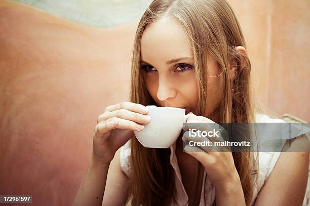 Positive Young Woman Drinking Coffee Stock Photo - Download Image Now - Adult, Adults Only, Beautiful People