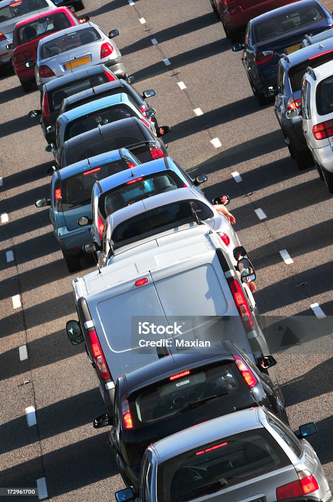 Long line of traffic in the summer A summer motorway hold up. Car Stock Photo