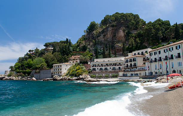 Resort A resort in the city of Taormina, Sicily,Italy. isola bella taormina stock pictures, royalty-free photos & images