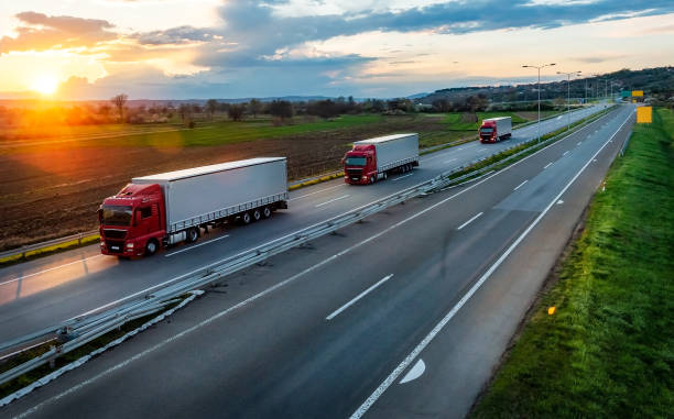 istock Convoy or Fleet of red trucks 1729623229