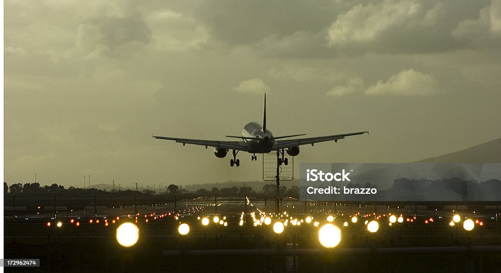Plane landing A Aeroplane lands on a runway Accuracy Stock Photo