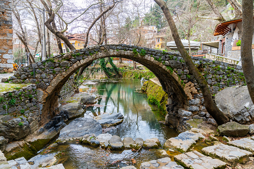 Livadia, Greece - 13 March 2023 -Old stone bridge in the old part of Livadia