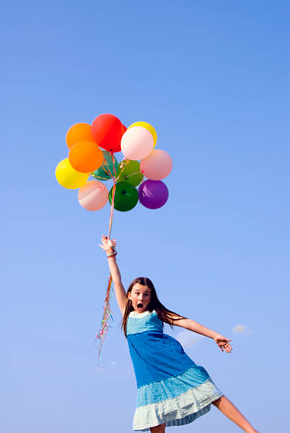 spazzato via - balloon moving up child flying foto e immagini stock