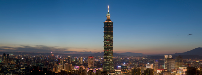 A wide panoramic view of Taipei Skyline during the early evening hours. With Taipei 101, the world tallest Skyscraper. Ground to highest architechual structure 509,2m. High resolution picture can be easily cropped to suit.
