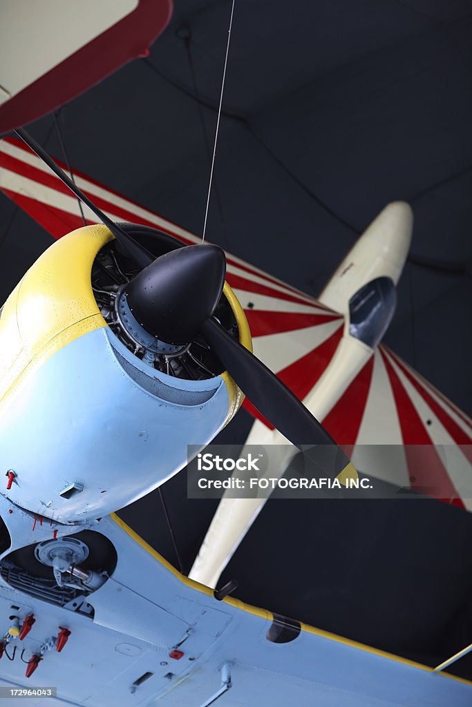 Old Airplanes 2 vintage airplanes. Focus on the propeller engine in the foreground. Aerospace Industry Stock Photo