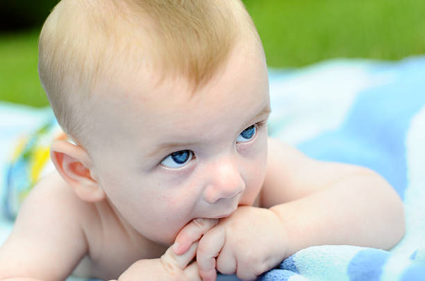 Baby With Blue Eyes stock photo