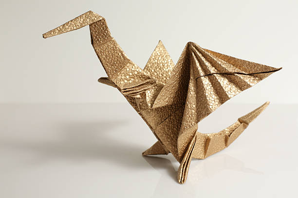 istock Gold origami dragon paper craft 172964467
