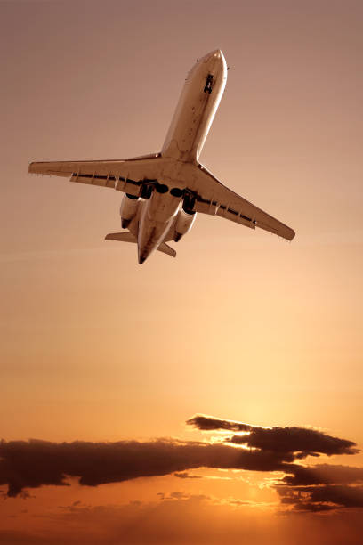istock XXL corporate jet airplane landing at sunset 172964886