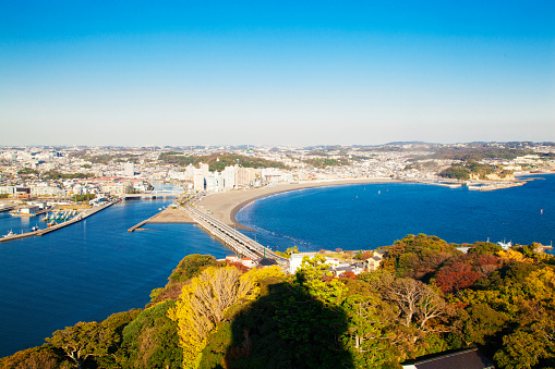 View fujisawa view of the city and the Izu Peninsula from Enoshima Sea Candle, located within Enoshima Samuel cocking garden. Kamakura, Japan