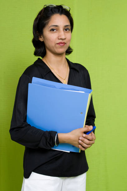 istock Young Confident Indian Businesswoman holding a File 172965106