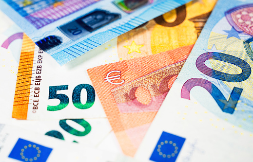 panorama of Euro  banknotes and coins of european currency