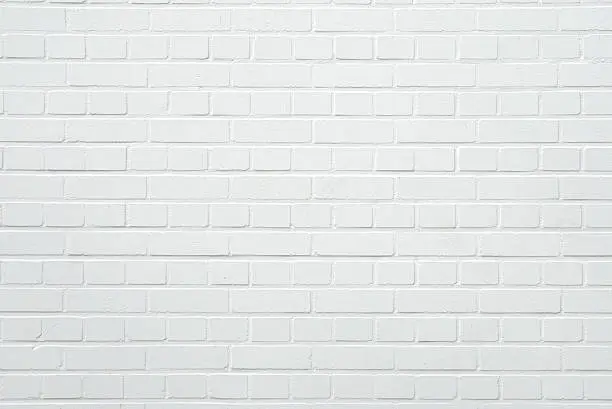 A blank white mediterranean brick wall with copy space.Photographed in Spain.