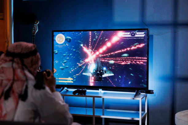 istock Arab man playing a game on television 1729661586
