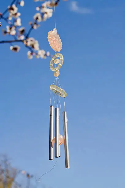 Selective focus on the wind chimesPlease check 'Spring signs' lightbox: