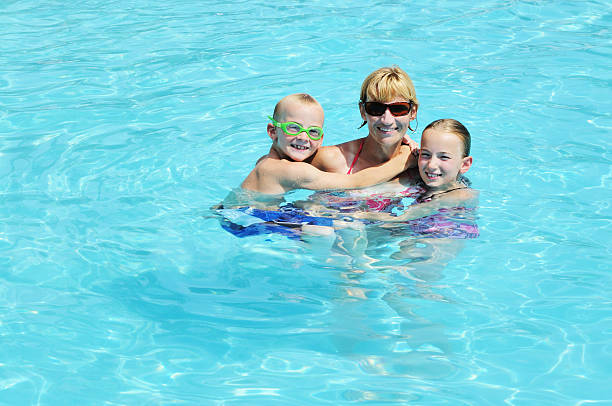 istock Family Playing in Pool 172966842