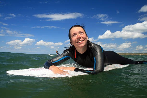 Surfer girl stock photo