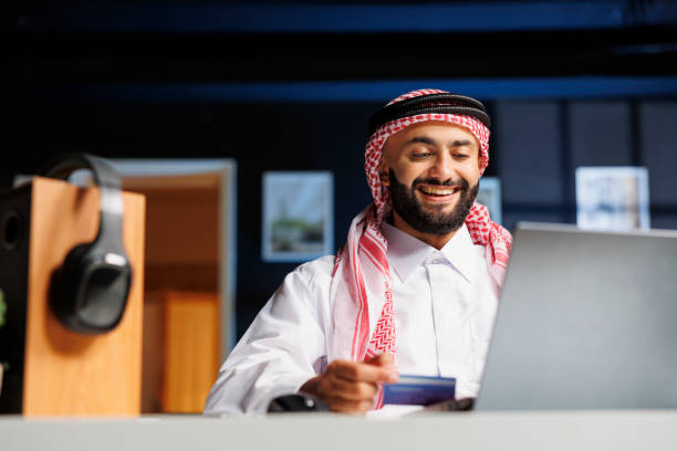 istock Arab businessman online shopping 1729676644
