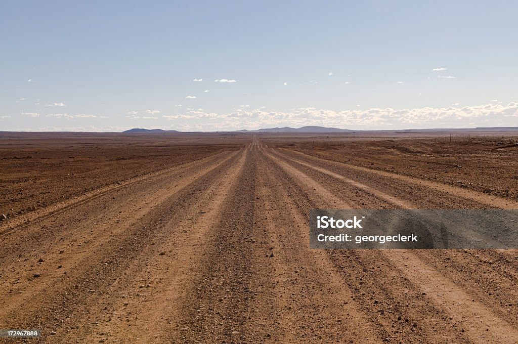 Unsealed Outback Road Desert road in the Australian Outback. Australia Stock Photo