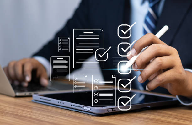 istock Digital Checklists for efficient business management, Businessman touching marking on checklist guide to paperless assessment and Future Success, Streamlining operations with online surveys. 1729680382