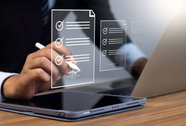 istock Efficient Electronic Signature Concept, Businessman using stylus pen signs electronic documents on digital documents on virtual tablet. Signing electronic documents for paperless transactions. 1729680383