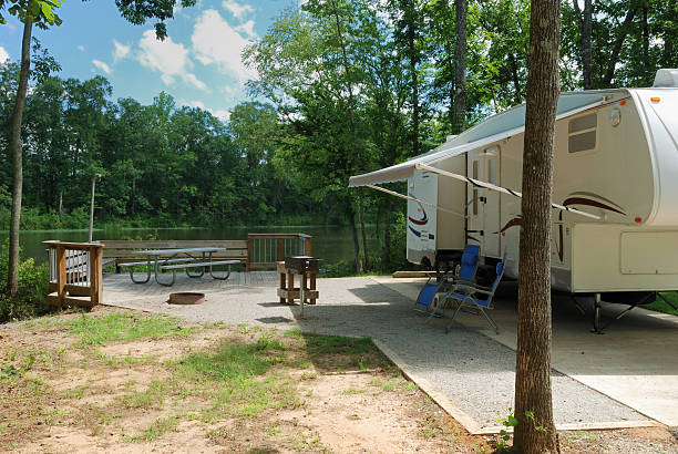 istock Fifth wheel rv trailer at campsite 172968300