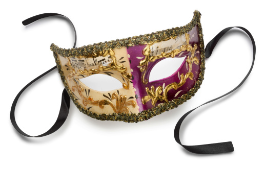 Venetian mask on white with soft shadow.