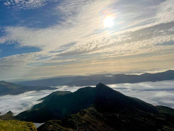 istock The view from the summit of Mount Snowdon over low clouds 1729691893
