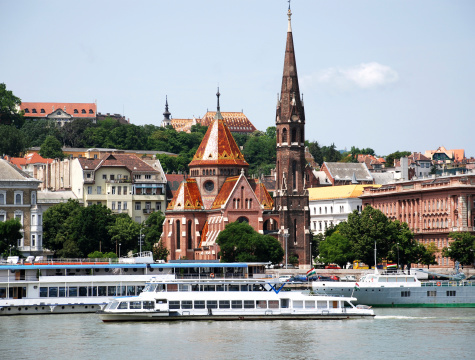 churches and cruising boats at Budapest city