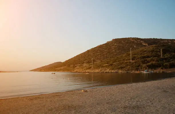 View of seabay with island in Porto Rafti in Greece.