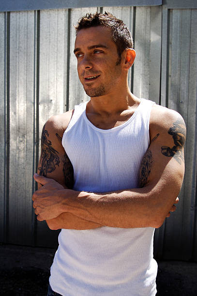Man In Wifebeater Stock Photos, Pictures & Royalty-Free Images - iStock Man In Wifebeater Stock Photos, Pictures & Royalty-Free Images - iStock