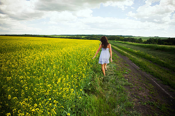istock Female walking the field 172971847