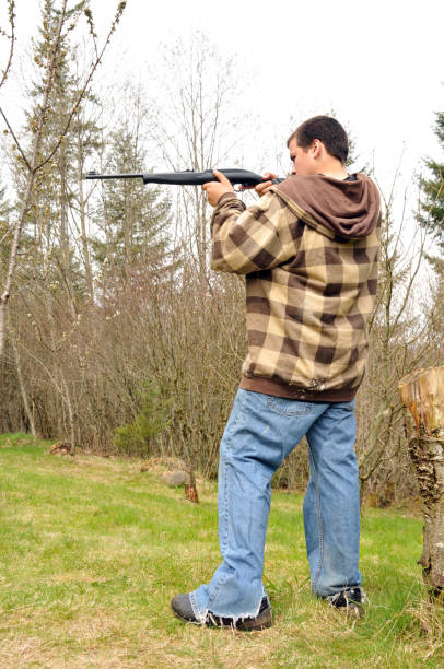 istock Teen Boy With a Rifle 172972650
