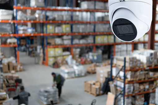 closed circuit camera Multi-angle CCTV system against the background of a modern warehouse complex. The concept of protection of goods.