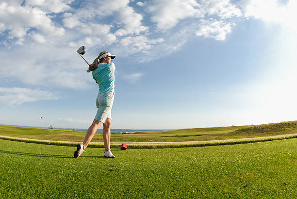istock Young woman playing golf 172972868
