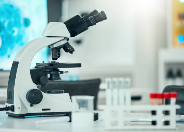istock Microscope, science and laboratory with DNA and blood test, pathology and investigation with medical research. Knowledge, health study and pharmaceutical with biology, biotechnology and equipment 1729731331