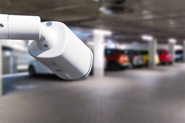 istock CCTV camera or surveillance system on indoor car parking. 1729737387