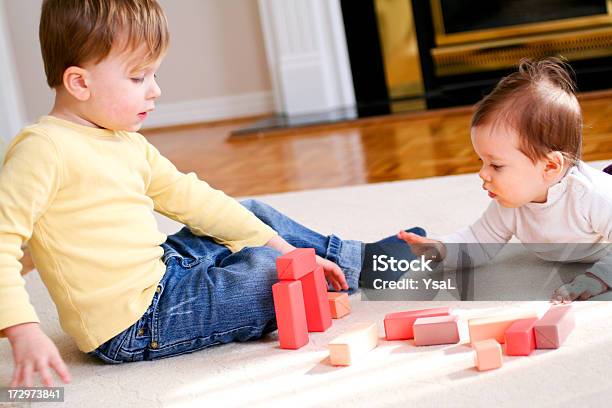 Brother And Sister Playing Together Stock Photo - Download Image Now - Baby - Human Age, Brother, Cheerful
