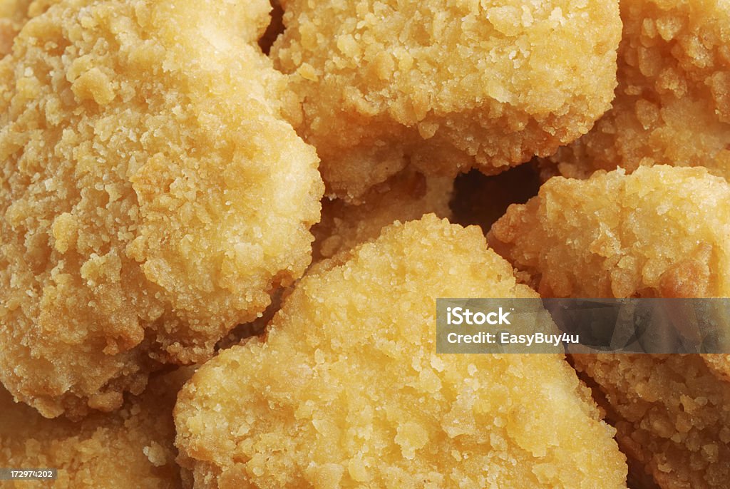 Pollo frito primer plano - Foto de stock de Nugget de pollo libre de derechos