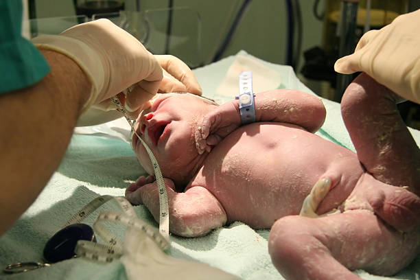 istock draw blood from the newborn baby 172975446
