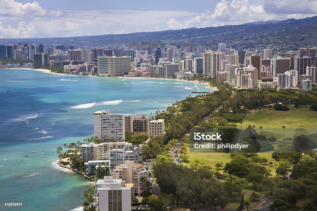 Hawaiian skyline Aerial view of the Honolulu skyline and Waikiki Beach with crystal clear turquoise waters. Aerial View Stock Photo