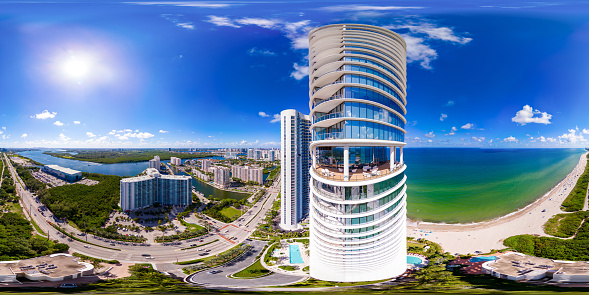Sunny Isles Beach, FL, USA - October 5, 2023: Equirectangular aerial 360 drone stock photo Club Level deck at The Ritz Residences