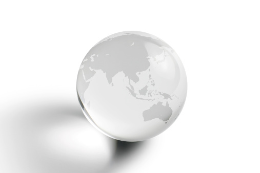 Crystal globe focusing on the Asia and Australia area, isolated on white background.