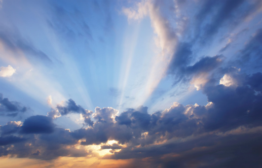 Daytime sun covered with thin cloud