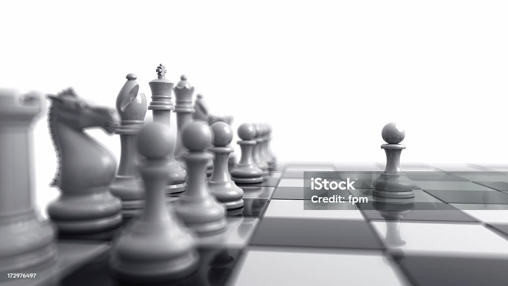 Chess I Royalty free 3d rendering of one brave pawn stepping forward. Black And White Stock Photo
