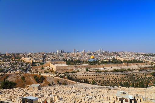 Jerusalem Temple Mount with Dome of the Rock. UNESCO World Heritage site. Mount of Olives Jewish Cemetery in foreground.