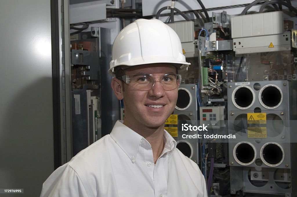 Factory Engineer Factory Engineer or Inspector checking electrical circuits. Blue-collar Worker Stock Photo